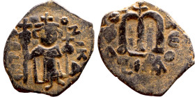 Constans II (641-668) Follis. Obverse: Imperial figure holding globus Reverse: m and inscription

 21mm 3.97g