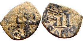 Constans II (641-668) Follis. Obverse: Imperial figure holding globus Reverse: m and inscription

 22mm 4.73g