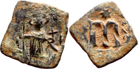 Constans II (641-668) Follis. Obverse: Imperial figure holding globus Reverse: m and inscription

 21mm 4.82g