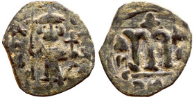 Constans II (641-668) Follis. Obverse: Imperial figure holding globus Reverse: m and inscription

 21mm 3.65g