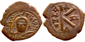 Maurice Tiberius (582-602) Half Follis. Obverse: Helmeted and cuirassed bust facing, holding globus cruciger and shield., Reverse: Large K above cross...