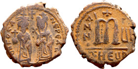 Phocas and Leontia.(602-610). Follis. . Obverse: Standing Phocas and Leonita Reverse: Large m between ANNO and regnal year.

 28mm 9.66g

 Artific...