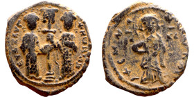 Constantine X and Eudoxia (1059-1067) Follis. Obverse: Constantine and Eudoxia holiding Labarum. Reverse: Standing christ

 24mm 10.58g