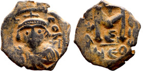 Constans II (641-668) Follis. Obverse: Imperial figure holding globus Reverse: m and inscription

 21mm 4.72g