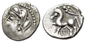 Central Gaul, Bituriges Cubi, c. 1st century BC. AR Quinarius (14mm, 1.80g). Bare male head l. R/ Horse prancing l.; sword above; symbol below. D&T 34...