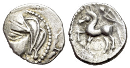 Central Gaul, Bituriges Cubi, c. 1st century BC. AR Quinarius (15mm, 1.92g, 6h). Bare male head l. R/ Horse prancing l.; sword above; symbol below. D&...