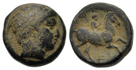 Kings of Macedon. Philip II (359-336 BC). Æ (16mm, 6.3g). Diademed head of apollo r. R/ Horseman r.; below torch. Apparently unpublished; SNG ANS -; S...