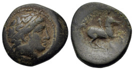 Kings of Macedon. Philip II (359-336 BC). Æ (20,2mm, 5.8g). Head of Apollo r., wearing tainia. R/ Horseman riding r.; below E. SNG ANS 915-8.