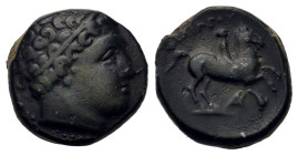 Kings of Macedon. Philip II (359-336 BC). Æ (17,8mm, 6.4g). Uncertain mint in Macedonia. Diademed head of Apollo to right. R/ Youth on horseback to ri...