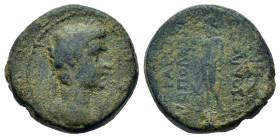 Augustus (27 BC-AD 14). Caria, Trapezopolis. Æ (18mm, 5.30g). Apollodotos, son of Lykotos, magistrate. Laureate head r.; lituus to r. R/ Apollo standi...