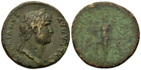 Hadrian (117-138). Æ Sestertius (33,8mm, 25g). Rome, AD 124-128. Laureate bust right, slight drapery. R/ Virtus standing left, right foot on helmet, h...