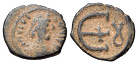 Justinian I (527-565). Æ Pentanummium (14mm, 1.68g, 11h). Theoupolis. Diademed, draped and cuirassed bust of Justinian r. R/Large E with cross at cent...