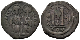 Justin II and Sophia (565-578), (dated RY 7=571/2 AD). Æ Follis (31mm, 11.6g). Constantinople. Justin l. and Sophia r., seated facing on double-throne...