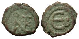 Justin II (565-578). Æ 5 Nummi (15mm., 2,68g). Constantinople. Monogram of Justin and Sophia. R/ Large E, B to right. Sear 363.