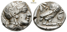 ATTICA, Athens. Circa 454-404 BC
Obv: Helmeted head of Athena right, with frontal eye 
Rev: ΑΘΕ
Owl standing right, head facing, closed tail feathers;...