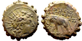Antiochos VI Dionysos (Seleukid King: 145-141 BC). AE bronze. Obv.: radiate and wreathed head r. Rev.: elephant standing l., holding torch with trunk;...