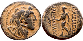 Alexander I Ballas (Seleukid king: 150-145) Bronze. Obv: Head of Alexander I right in lion skin headdress Rev: Apollo standing left, testing arrow and...