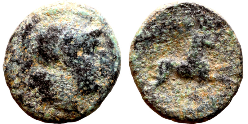Hellenistic period coin (4-1 century BC) AE Bronze. Obverse: Bust of Athena. Rev...