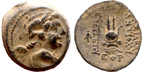 Antiochos VII (Seleukid King: 138-129 BC). AE bronze. Obv.: Bust of winged Eros right. Rev.: Headdress of Isis