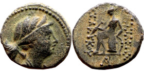 Seleukos II Kalinikos (Seleukid King: 246 - 226 BC) AE bronze. Obv Obv.: : Diademed head of Seleucus II right Reverse: Apollo seated left on omphalos,...