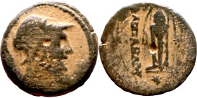 Hellenistic period coin (4-1 century BC) AE Bronze. Obverse: Helemted bust Reverse: Tripod