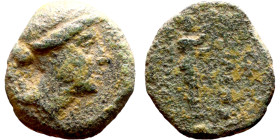 Uncertain Ruler (Seleukid Kings: III-I BC). AE bronze. Obv.: Bust of Apollo right. Rev.: Unredable