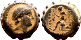 Seleukos II Kalinikos (Seleukid King: 246 - 226 BC) AE bronze. Obv Obv.: : Diademed head of Seleucus II right Reverse: Apollo seated left on omphalos,...