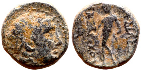 Antiochos III The Great (Seleukid King: 223-187 BC). AE bronze. Obv.: Laureate head of Apollo Rev.: Apollo seated left on omphalos, testing arrow and ...