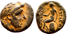 Antiochos III The Great (Seleukid King: 223-187 BC). AE bronze. Obv.: Laureate head of Apollo Rev.: Apollo seated left on omphalos, testing arrow and ...