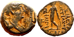 Demetrius I Soter (Seleukid King: 162 150 BC) AE bronze coin. Obv.:: Draped bust of Artemis . Rev.: Apollo standing left, testing arrow and resting le...