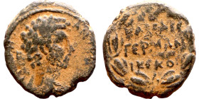 Marcus Aurelius  (161 – 180) Bronze  Obverse: Bust of Emperor. Reverse: Wreath Inscription