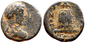 Antoninus Pius (138-161) Syria: Antioch, bronze. Obverse: Bust of Emperor. Reverse: Temple with four columns containing seated figure facing, on rocky...
