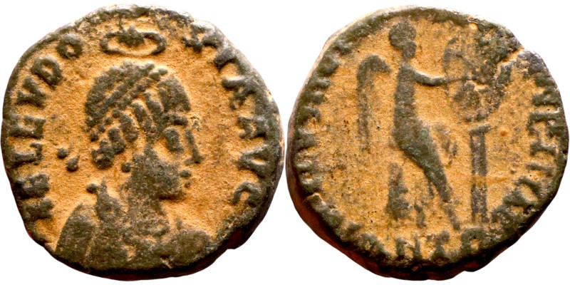 Aelia Eudoxia. (401-403 AD). Follis. Obv: AEL EVDOXIA AVG. Pearl-diademed, drape...