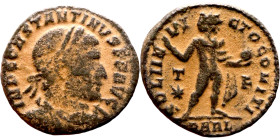 Constantinus I (307-337 AD). Follis. Obv: IMP CONSTANTINVS PF AVG. laureate bust of Constantinus left. Rev: SOLI INVICTO COMITI. Sol standing left hol...
