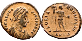 Theodosius I (379-395) Follis. Obv: DN THEODOSIVS PF AVG, diademed, draped, bust righ Reverse: GLORIA ROMANORVM Emperor standing right, holding labaru...