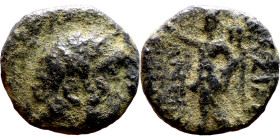 Antiochos III The Great (Seleukid King: 223-187 BC). AE bronze. Obv.: Laureate head of Apollo Rev.: Apollo seated left on omphalos, testing arrow and ...