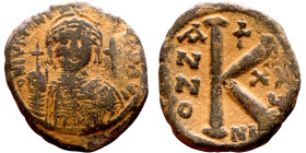 Justinian I. (527-565)Half Follis. Constantinople. Obverse: :D N IVSTINIANVS P P AVG, diademed, helmeted, and cuirassed facing bust holding globus cru...