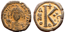 Justinian I. (527-565)Half Follis. Constantinople. Obverse: :D N IVSTINIANVS P P AVG, diademed, helmeted, and cuirassed facing bust holding globus cru...