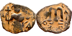 Constans II (641-668) Follis. Obverse: Imperial figure holding cross and globus Reverse: m and inscription