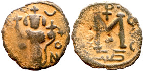 al-Malik ibn Marwan (687-705), Constans II style folis Obverse: Imperial figure holding globus Reverse: m and inscription