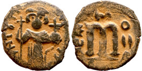 Constans II (641-668) Follis. Obverse: Imperial figure holding cross and globus Reverse: m and inscription