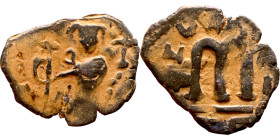 al-Malik ibn Marwan (687-705), Constans II style folis Obverse: Imperial figure holding globus Reverse: m and inscription