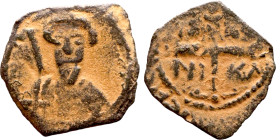 Tancred (Regent: 1101-1103, 1104-1112). Follis. Antioch. Obverse: KE BOIΘH TANKRI.Bust of Tancred facing, wearing turban and chain mail, holding sword...