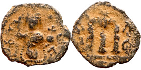 Constans II (641-668) Follis. Obverse: Imperial figure holding cross and globus Reverse: m and inscription
