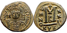 Justinian I (527-656) Follis. Obverse: DN IVSTINIANVS PP AVG, Armoured facing bust holding globus Reverse: Large M between ANNO and regnal year