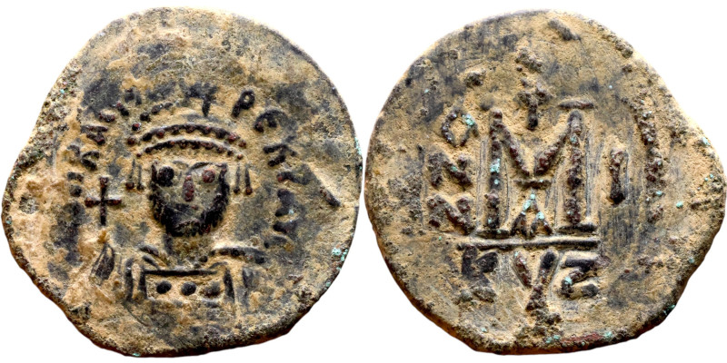 Heraclius (610-641) Half Follis. Obverse: Helmeted and cuirassed bust facing, ho...