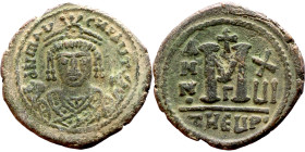 Maurice Tiberius (582-602) Follis. Antioch. Obverse: Crowned bust facing, wearing consular robes, holding mappa and eagle-tipped scepter , Reverse: La...
