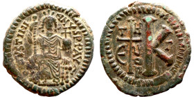 Justinian I (527-565) Half Follis. Antioch . Obverse: Justinian on throne. Reverse: Large K and Cross. THEUP