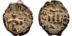 Constans II (641-668) Follis. Obverse: Imperial figure holding cross and globus Reverse: m and inscription