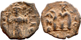 Constans II (641-668) Follis. Obverse: Imperial figure holding cross and globus Reverse: m and inscription